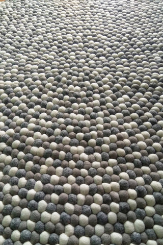 Natural colour felt rug