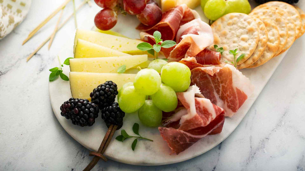 Marble charcuterie boards offer a beautiful and cool surface, creating luxury and sophistication feeling