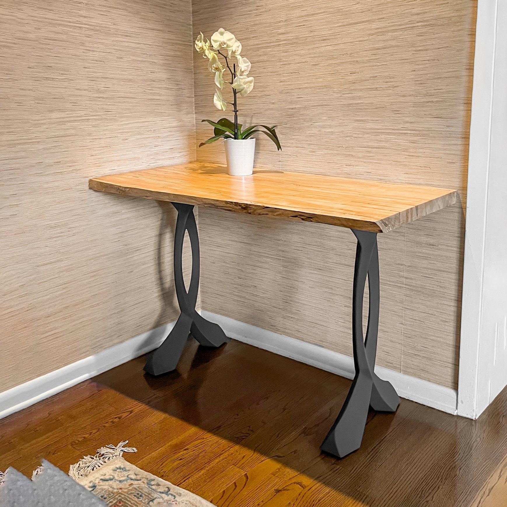 A console table is also a great way to fill up floor space and add an extra layer of elegance to your living room