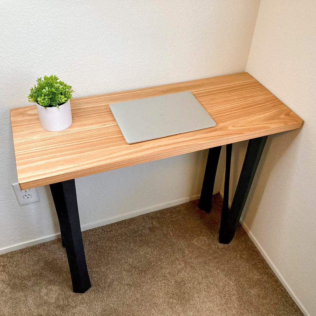 A console table is especially helpful if you don’t have enough space to keep a big desk in your home office