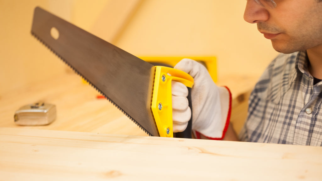 Using your saw, cut the wood to the appropriate length