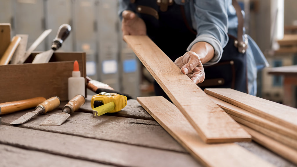 Place the wood beams or slabs on a level surface