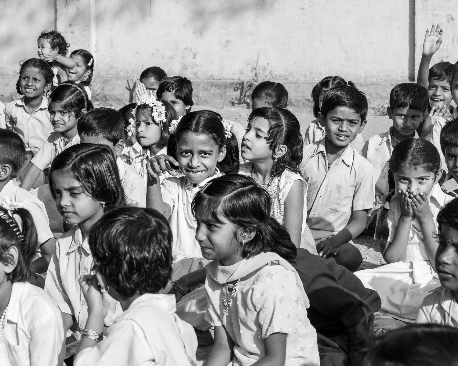 ic:I received consent from school administrators to photograph these children in a schoolyard in India