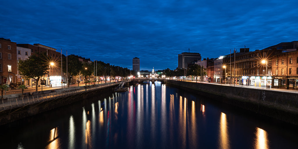 ic:Reflective Calm: Dublin's River Liffey mirrors the serene beauty of Ireland's capital, a testament to the city's harmonious blend with nature.