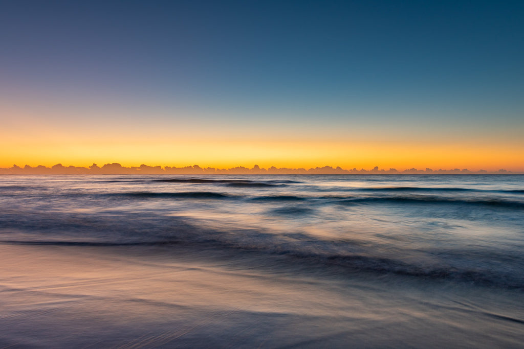 ic: Australia's Long Reef Beach just before sunrise