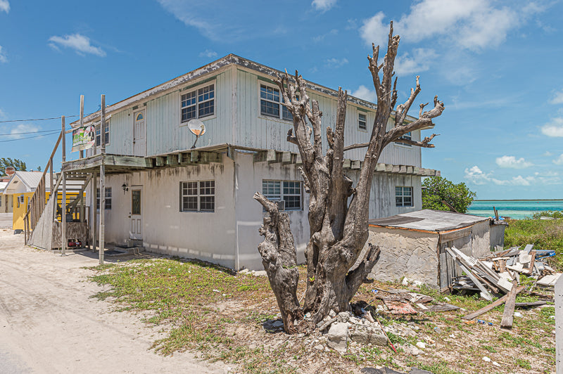 Old rundown beachfront home Bimini Bahamas