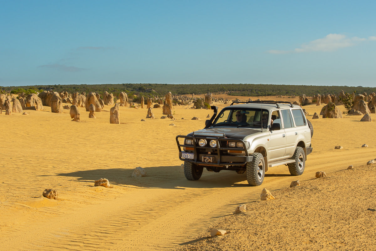 Truck drives through the Australian Pinnacles Park