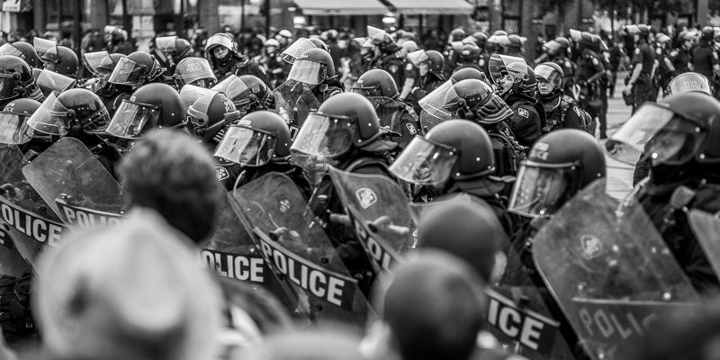 Dozens of police in riot gear 2010 G7 Summit Toronto Canada