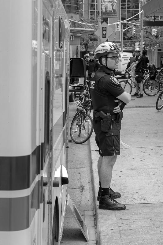 Policeman standing on the street