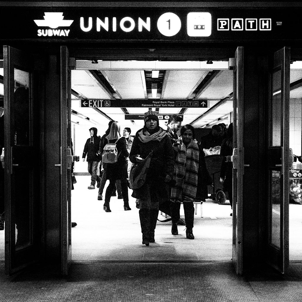 ic:Open doors to Toronto Union train station of people continue their journey