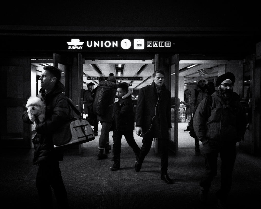 ic:Group of people leaving Union station on cold winter night