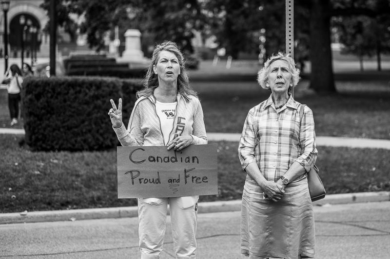 Two proud women in Toronto protesting-800px