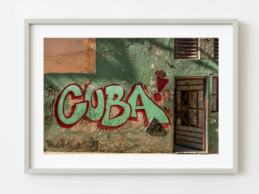 ic:Cuba graffiti on an old house wall