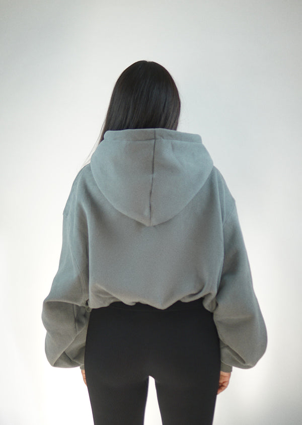 Get centred hoodie size 8 grey sage! The arms are the perfect length and it  is still cropped on me. I'm 5'7”, 160-170 lbs, I think the size smaller  wouldn't have worked