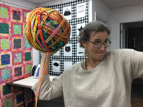 Francesca playing with her Jelly Roll rug ball.