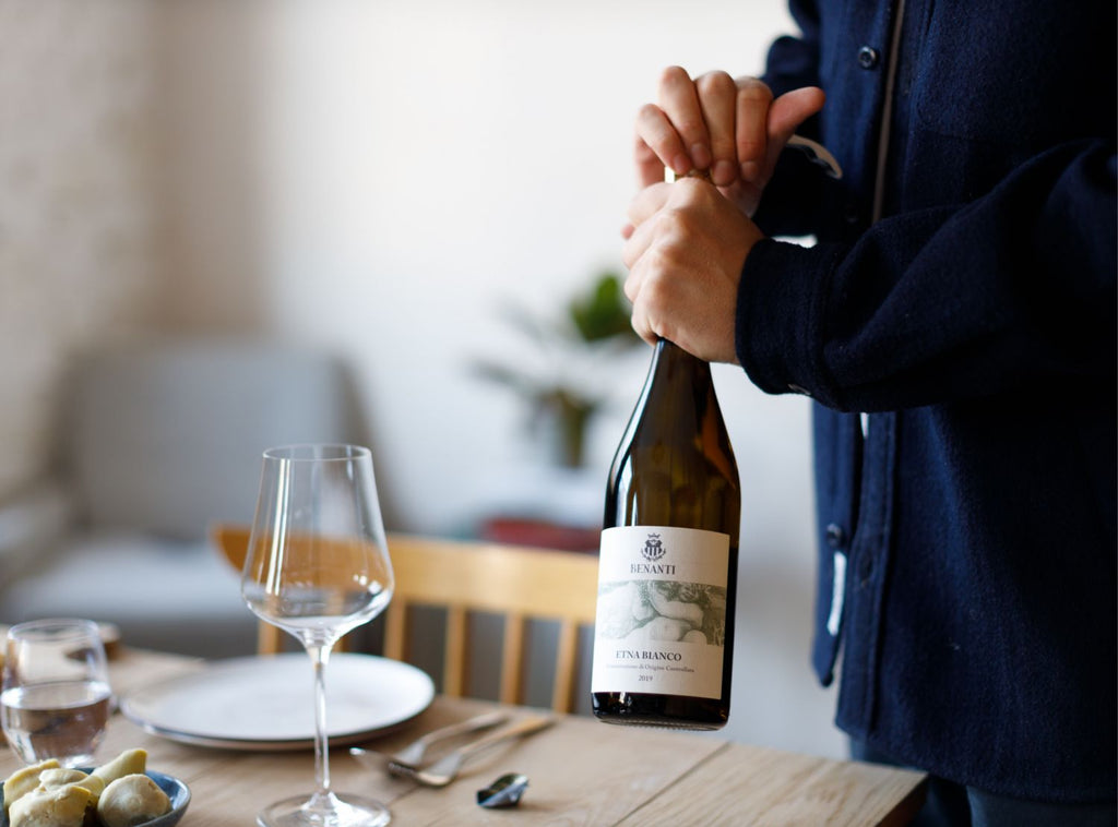 Sommelier Serving Wine