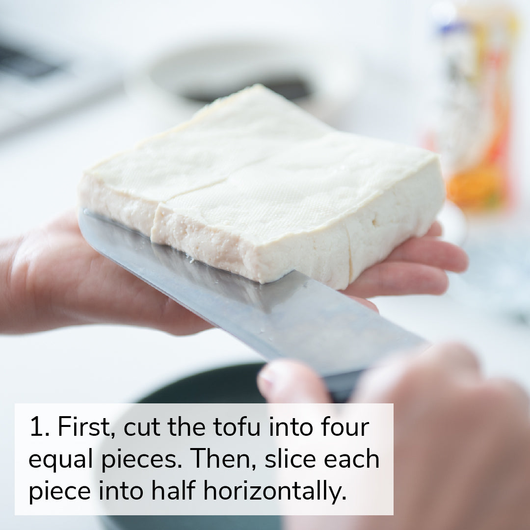 1. First, cut the tofu into four equal pieces. Then, slice each piece into half horizontally.