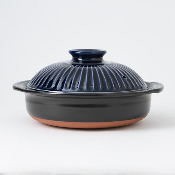https://cdn.shopify.com/s/files/1/0553/0461/8173/products/ginpo-kikka-banko-donabe-japanese-clay-pot-for-3-to-4-persons-musubi-kiln-handmade-japanese-tableware-and-japanese-dinnerware-644520_600x.jpg?v=1635852898