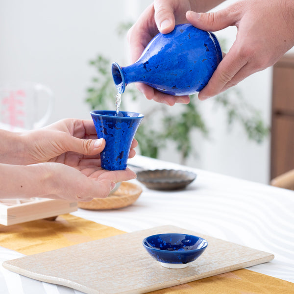https://cdn.shopify.com/s/files/1/0553/0461/8173/products/hibino-crystal-glaze-mino-ware-ochoko-sake-cup-musubi-kiln-handmade-japanese-tableware-and-japanese-dinnerware-627143_600x.jpg?v=1644937612
