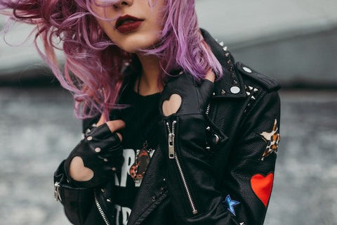 Girl wearing a leather jacket to emphasize finding the right leather jacket for your body type.