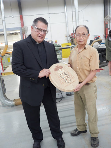 Bishop Lucia and Dung Tran at the Stickley factory