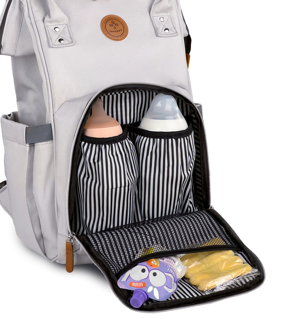 Interior of the front pocket of the Lenappy diaper bag in Icy Grey color.