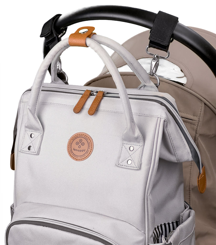 Lenappy diaper bag in Icy Grey color hanging on a Yoyo stroller using the provided stroller hooks