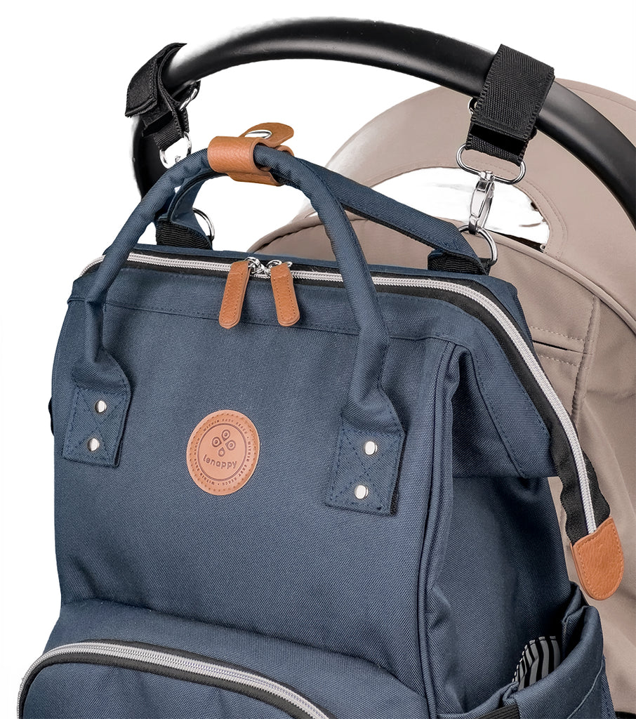 Lenappy diaper bag in Midnight Blue color hanging on a Yoyo stroller using the provided stroller hooks