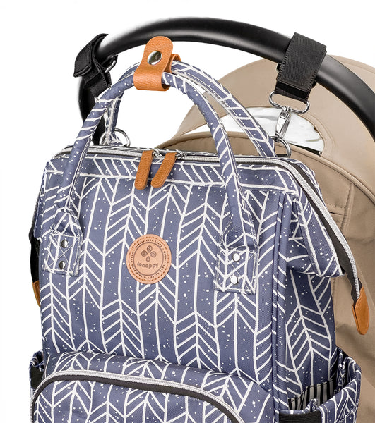 Lenappy diaper bag in Olive color hanging on a Yoyo stroller using the provided stroller hooks