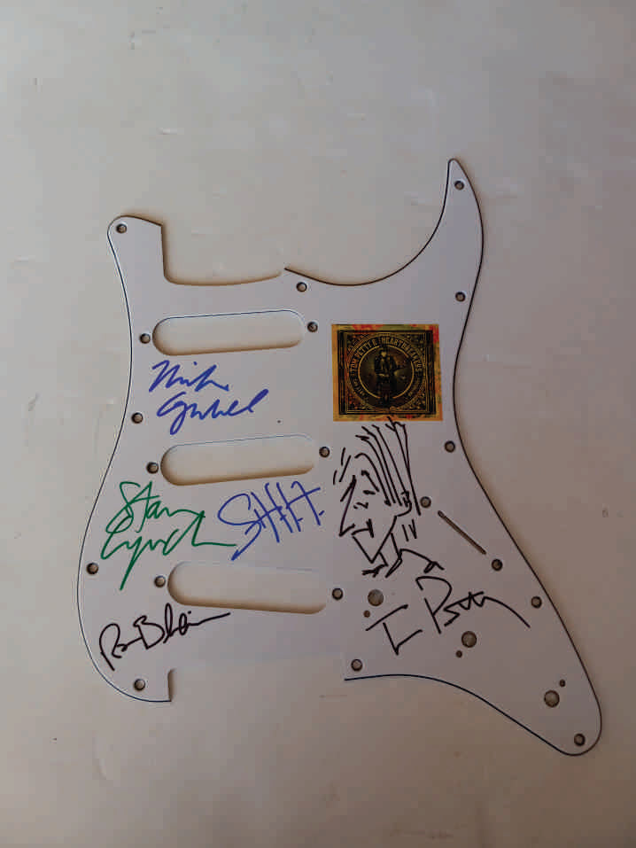 Tom Petty & The Heartbreakers guitar pickguard signed with proof