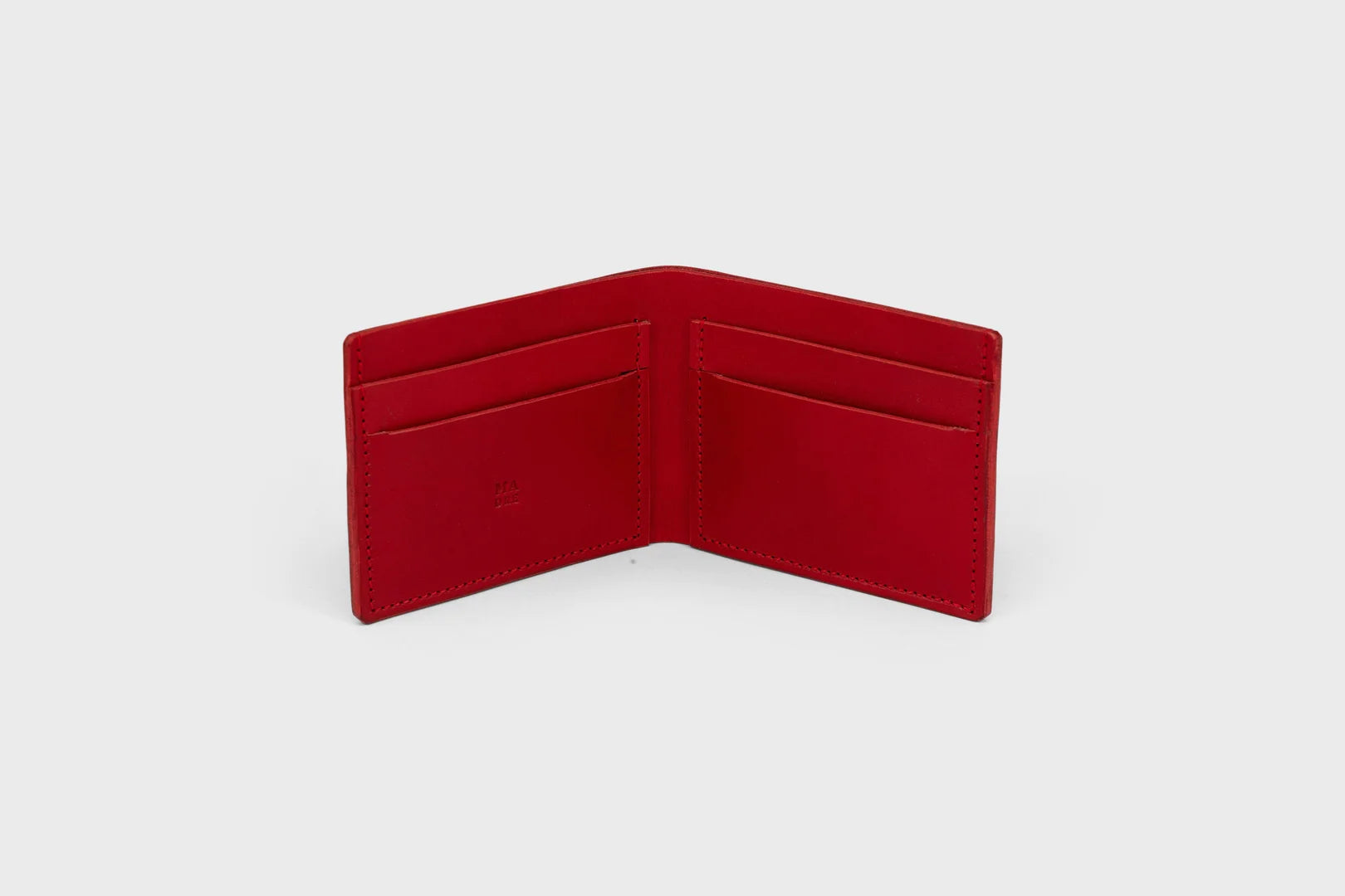 red leather wallet atelier madre manuel dreesmann barcelona