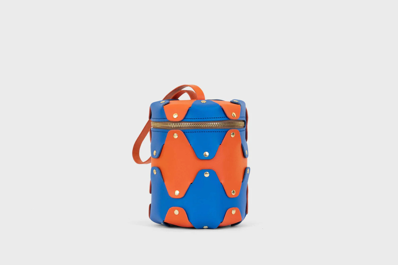 nema cylindrical bag orange blue leather atelier madre manuel dreesmann barcelona