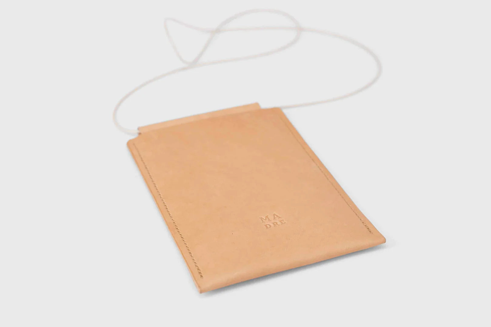 leather neck pouch atelier madre manuel dreesmann barcelona