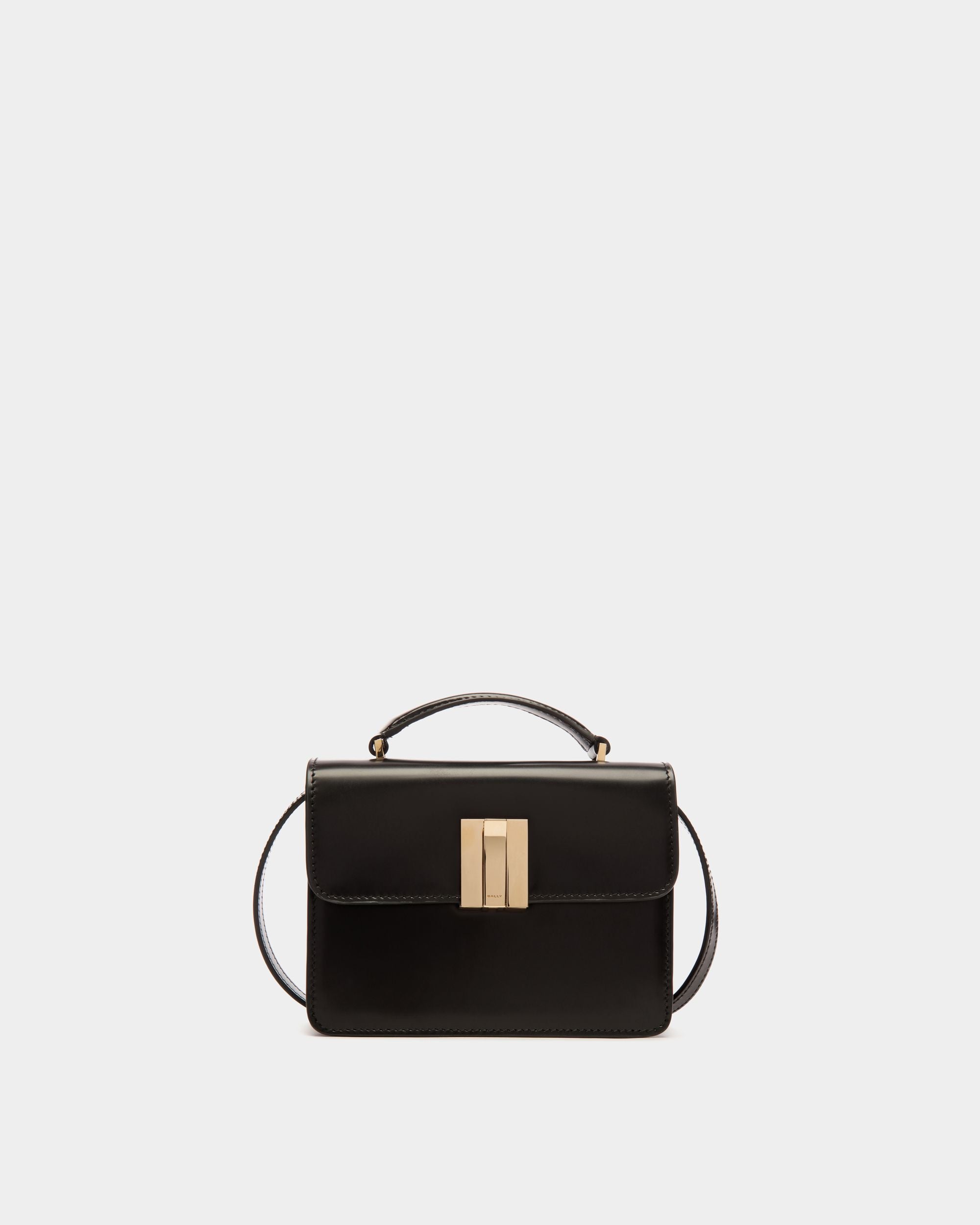 Women's Ollam Mini Top Handle Bag in Black Brushed Leather | Bally | Still Life Front