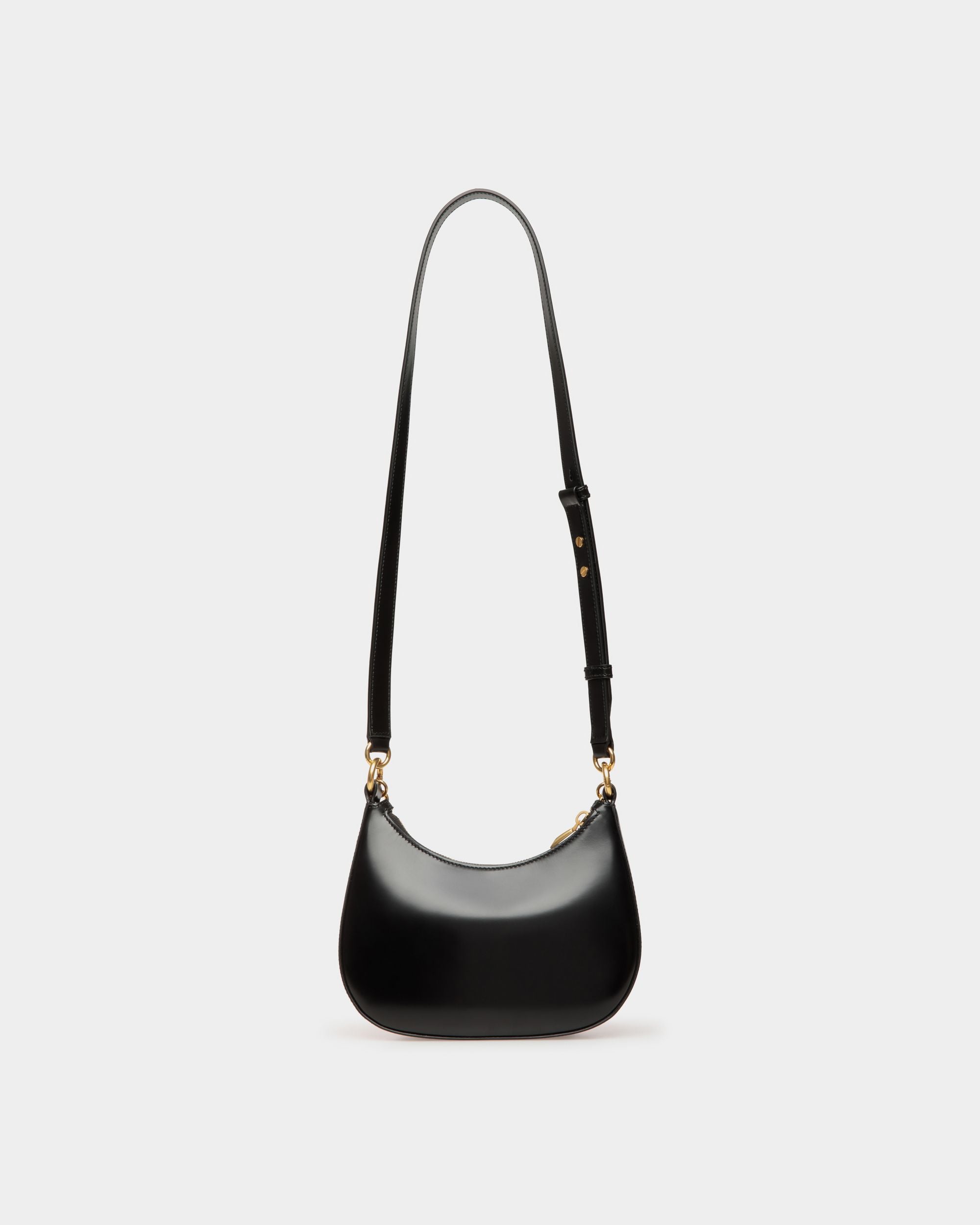 Emblem | Women's Mini Crossbody Bag in Black Brushed Leather | Bally | Still Life Back