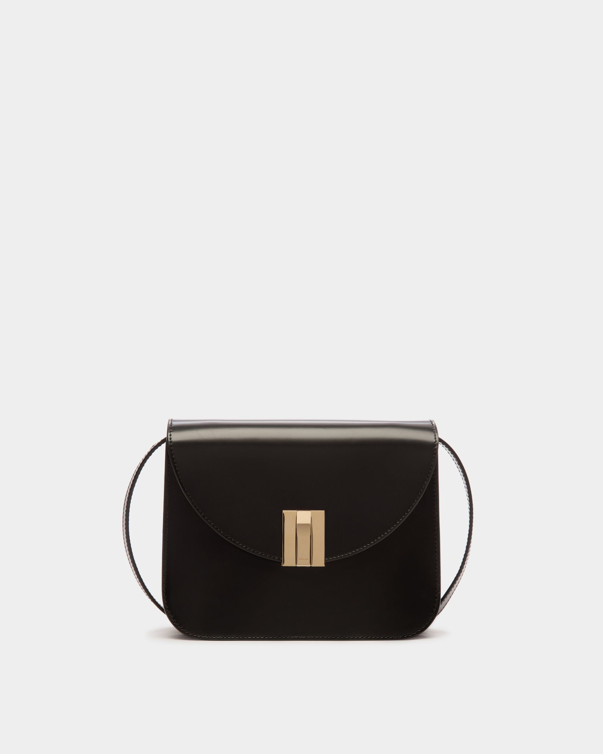 Ollam | Women's Crossbody Bag in Black Brushed Leather | Bally | Still Life Front