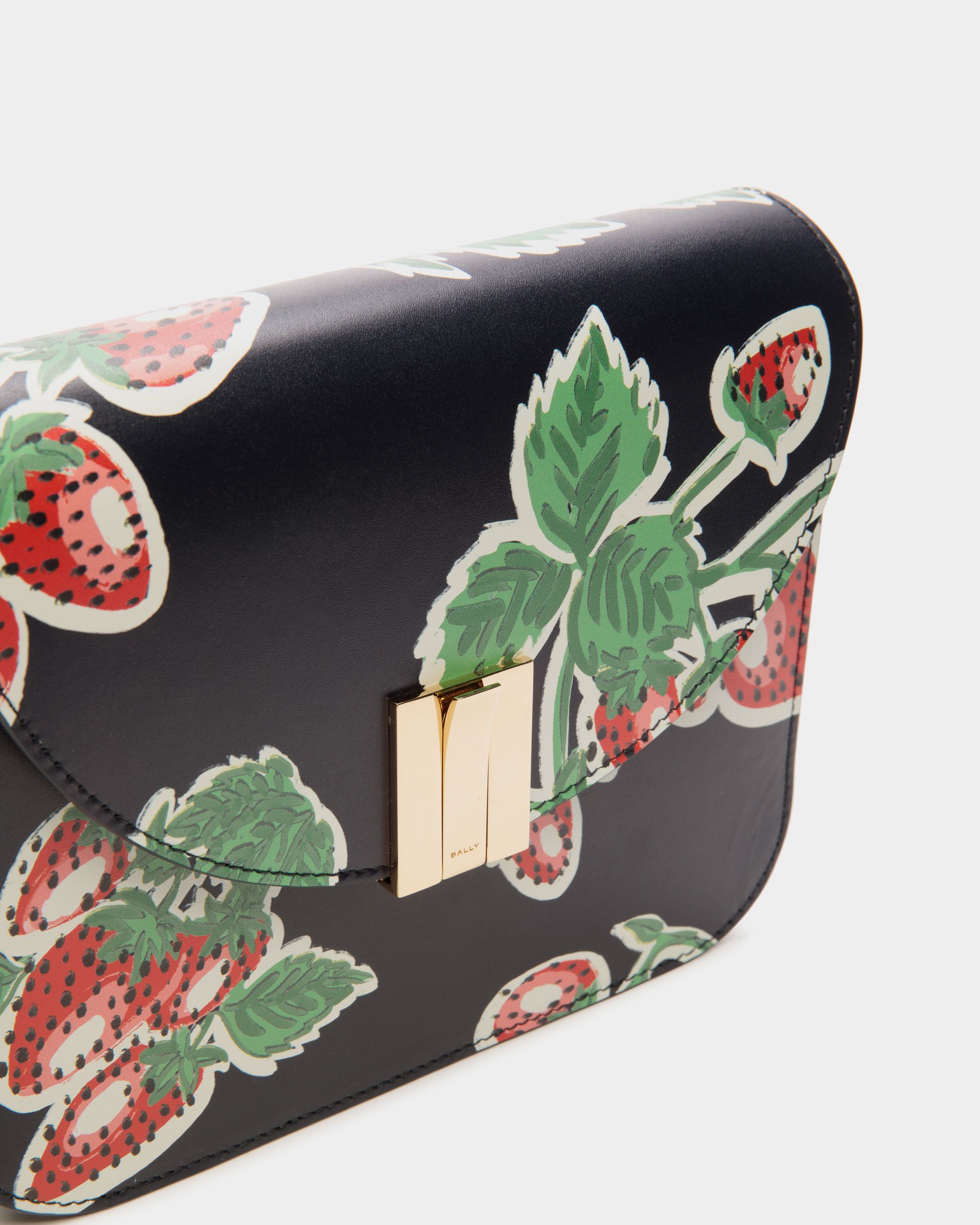 Ollam | Women's Crossbody Bag in Strawberry Print Leather | Bally | Still Life Detail