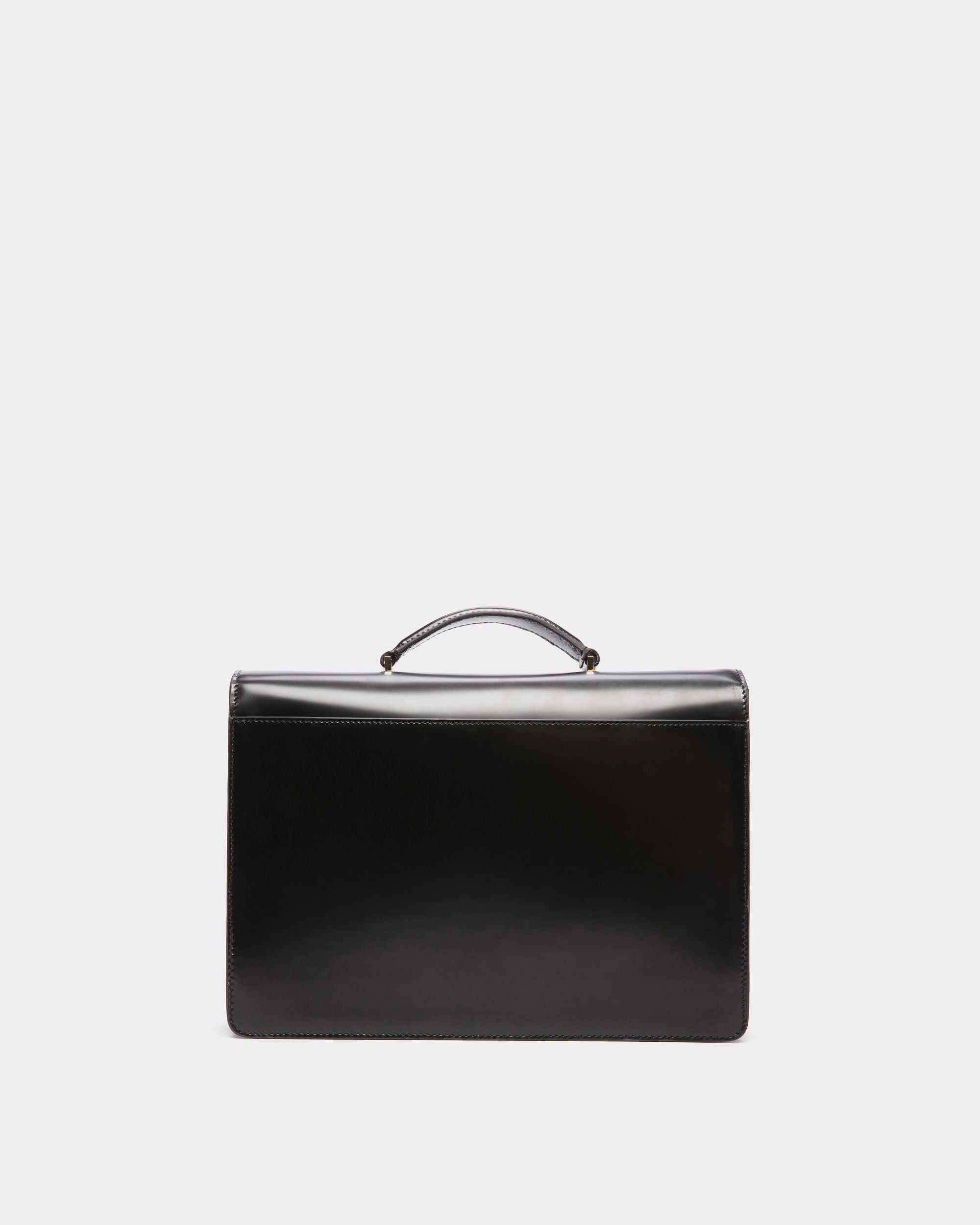 Ollam | Women's Top Handle Bag in Black Brushed Leather | Bally | Still Life Back