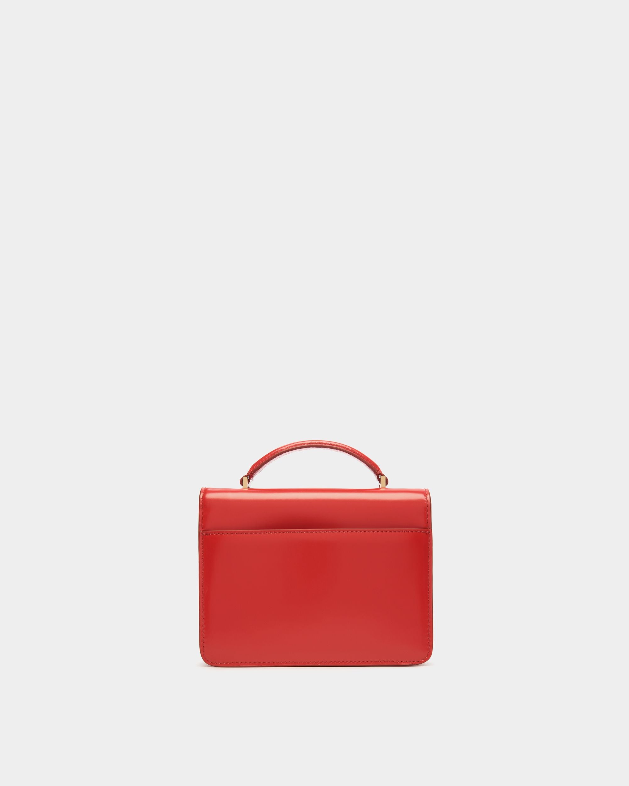 Women's Ollam Mini Top Handle Bag in Candy Red Brushed Leather | Bally | Still Life Back