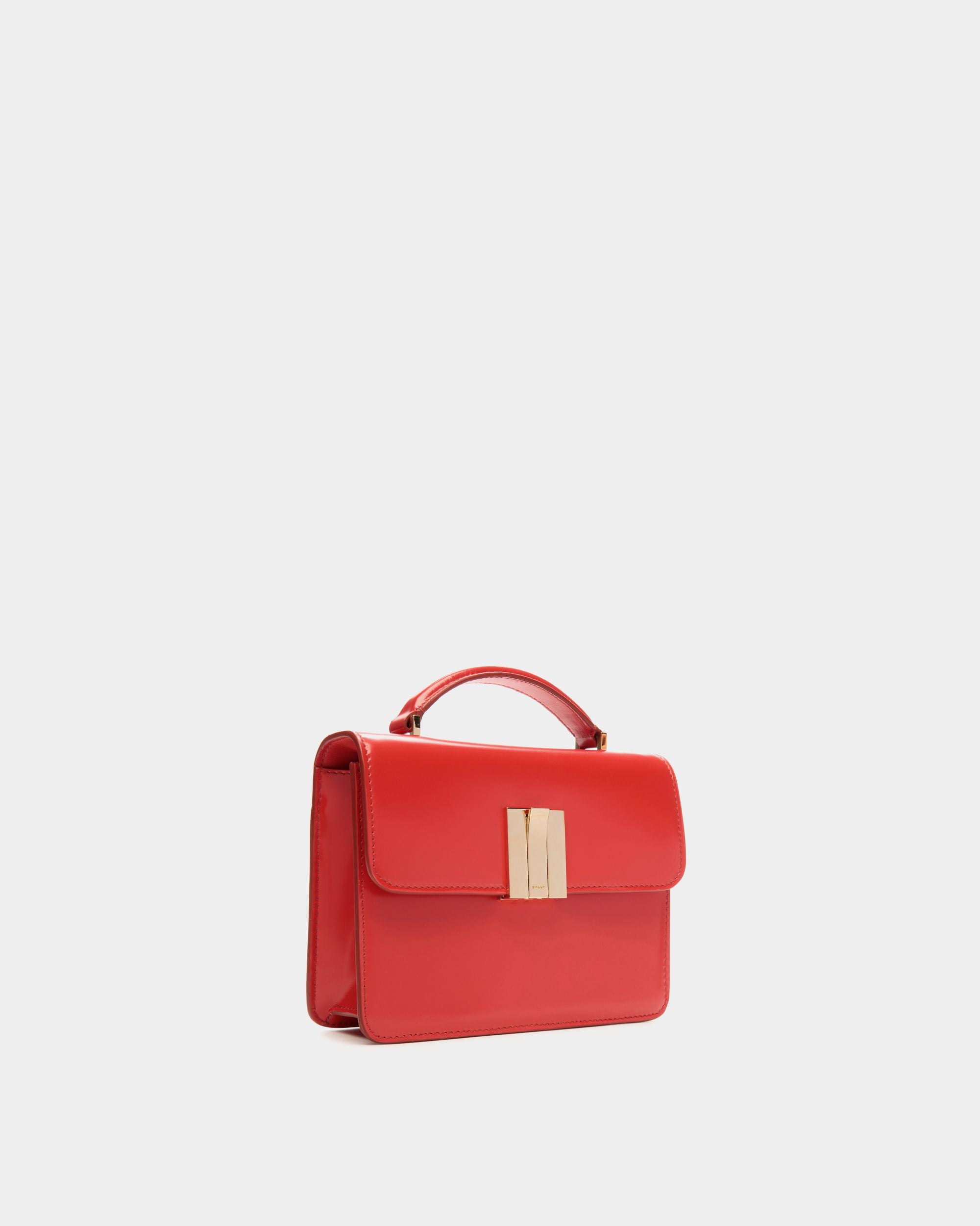 Women's Ollam Mini Top Handle Bag in Candy Red Brushed Leather | Bally | Still Life 3/4 Front