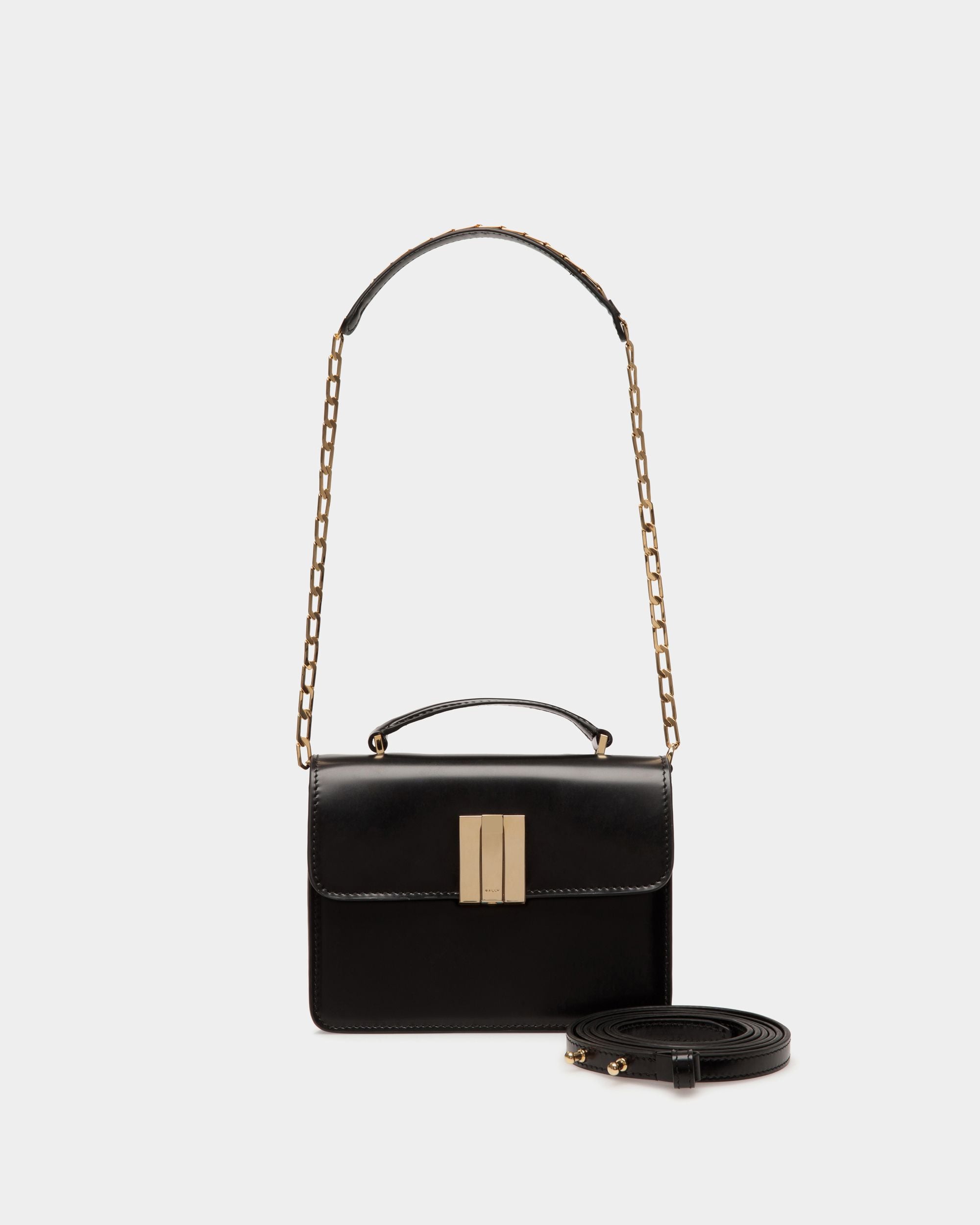 Ollam | Women's Mini Top Handle Bag in Black Brushed Leather | Bally | Still Life Detail