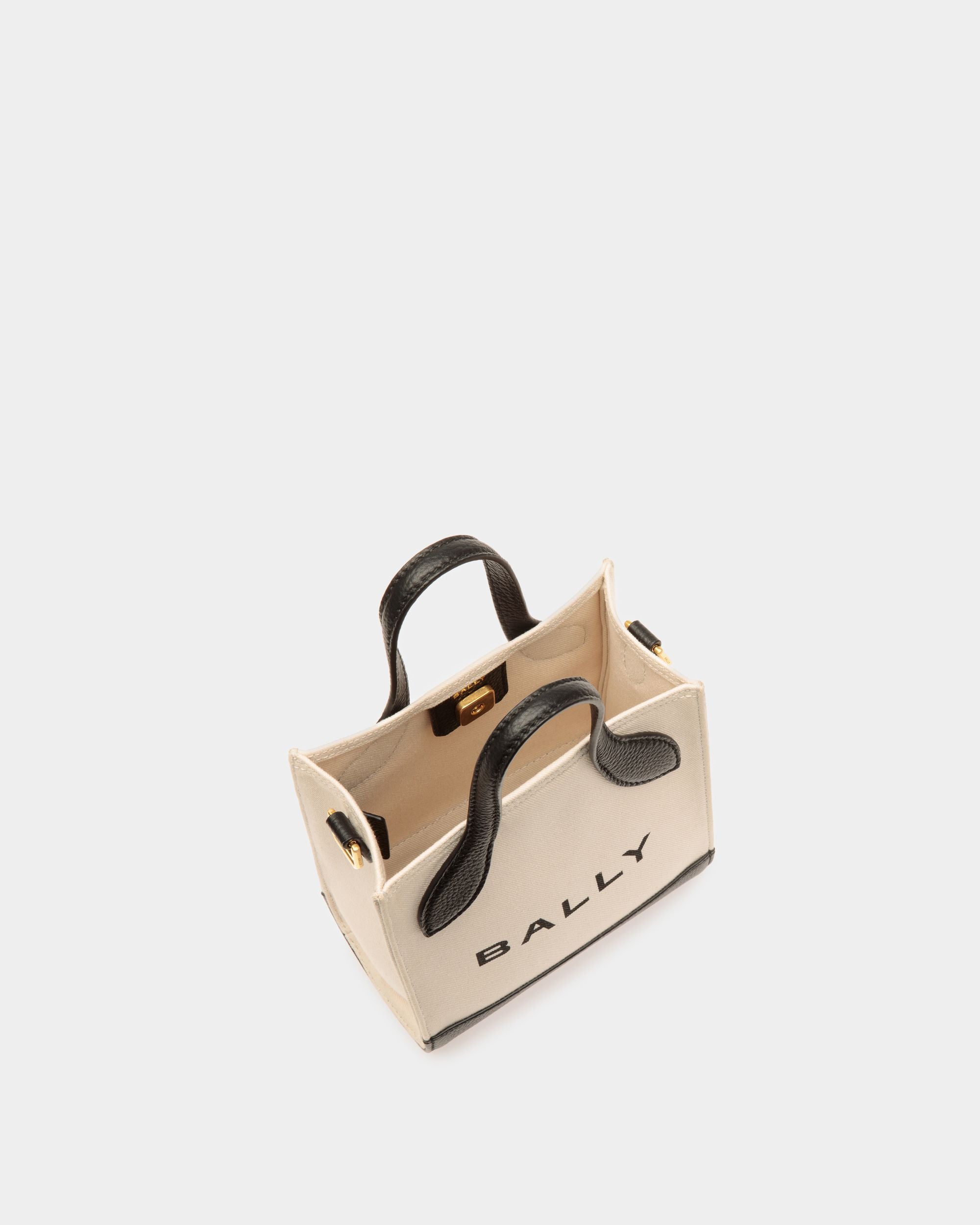 Bar | Women's Mini Tote Bag in Neutral And Black Canvas And Leather | Bally | Still Life Open / Inside