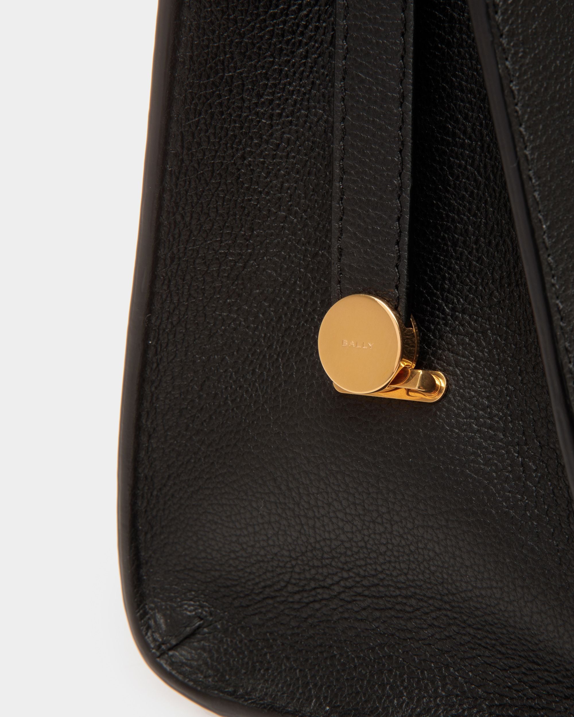 Emblem | Women's Shoulder Bag in Black Grained Leather | Bally | Still Life Detail