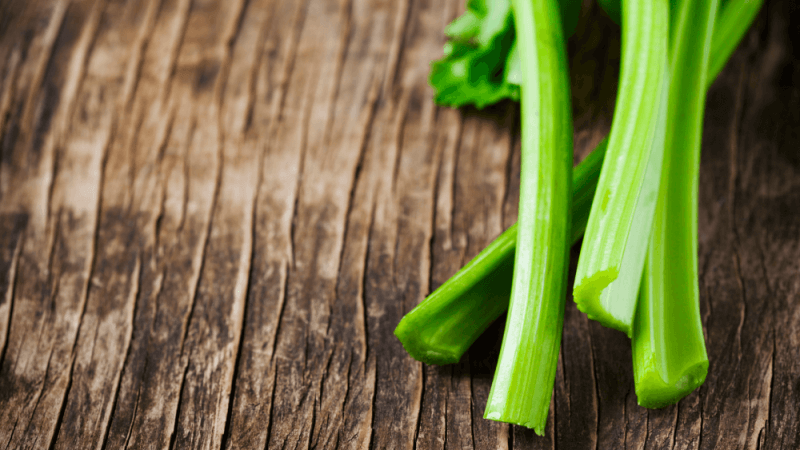 Celery on a chopping board