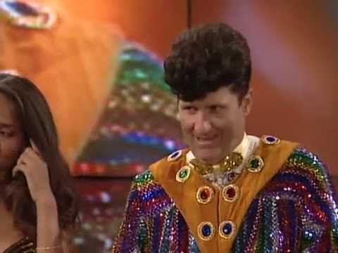 Al Bundy dressed as the reverend for the Church of No Ma'am, looking comically solemn