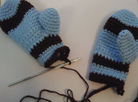 Knittedhome creates crochet baby blue and chocolate brown mittens for a little boy