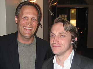 Chad Hurley (right) with Boris Seibert wearing the Plantronics Voyager 510