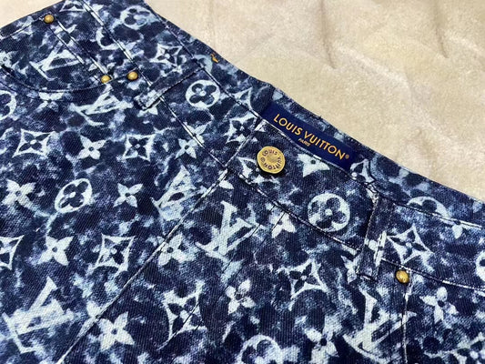 Louis Vuitton® Flocked Monogram Denim Mini Shorts Navy. Size 36 in