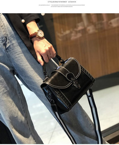 black leather handbag on sale