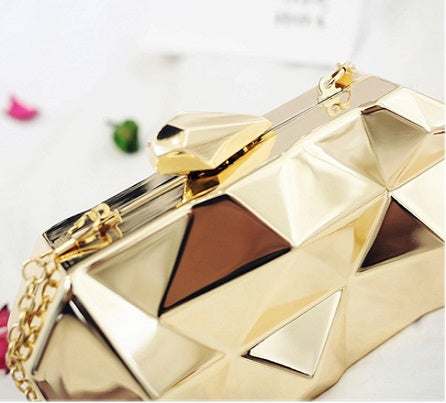 shiny metallic clutch bag geometric design